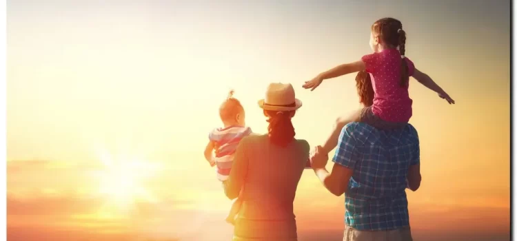 family looking at sunset together after recovering from addiction in a private drug rehab