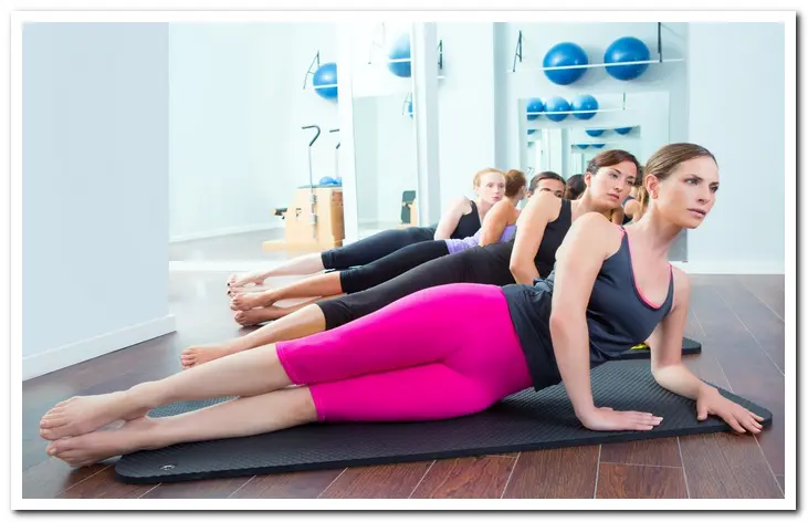 Women doing yoga in a holistic drug rehab center